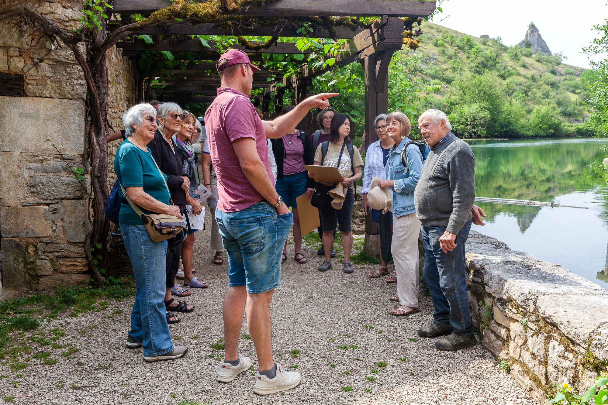 ardith Goodwin's group drinking Cahors and Bergerac wine at lunch